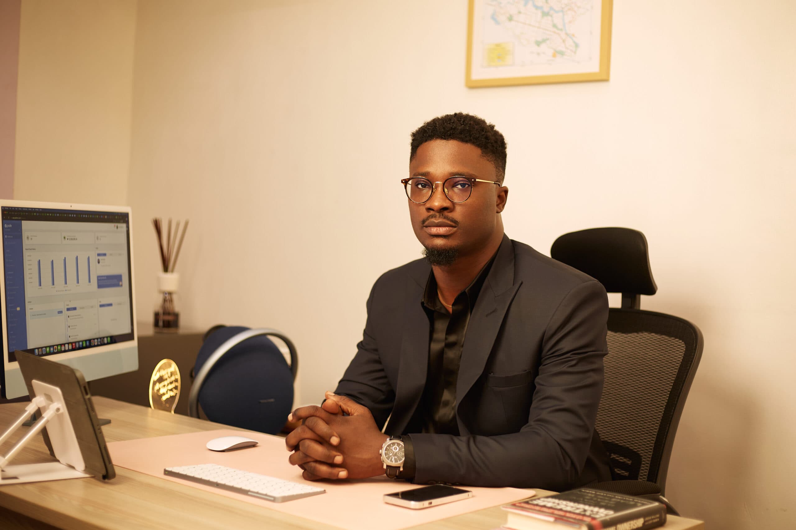 Seye Bamidele - Portfolio website owner, working at office